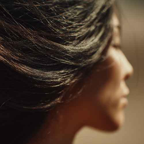 Woman with full flowing hair